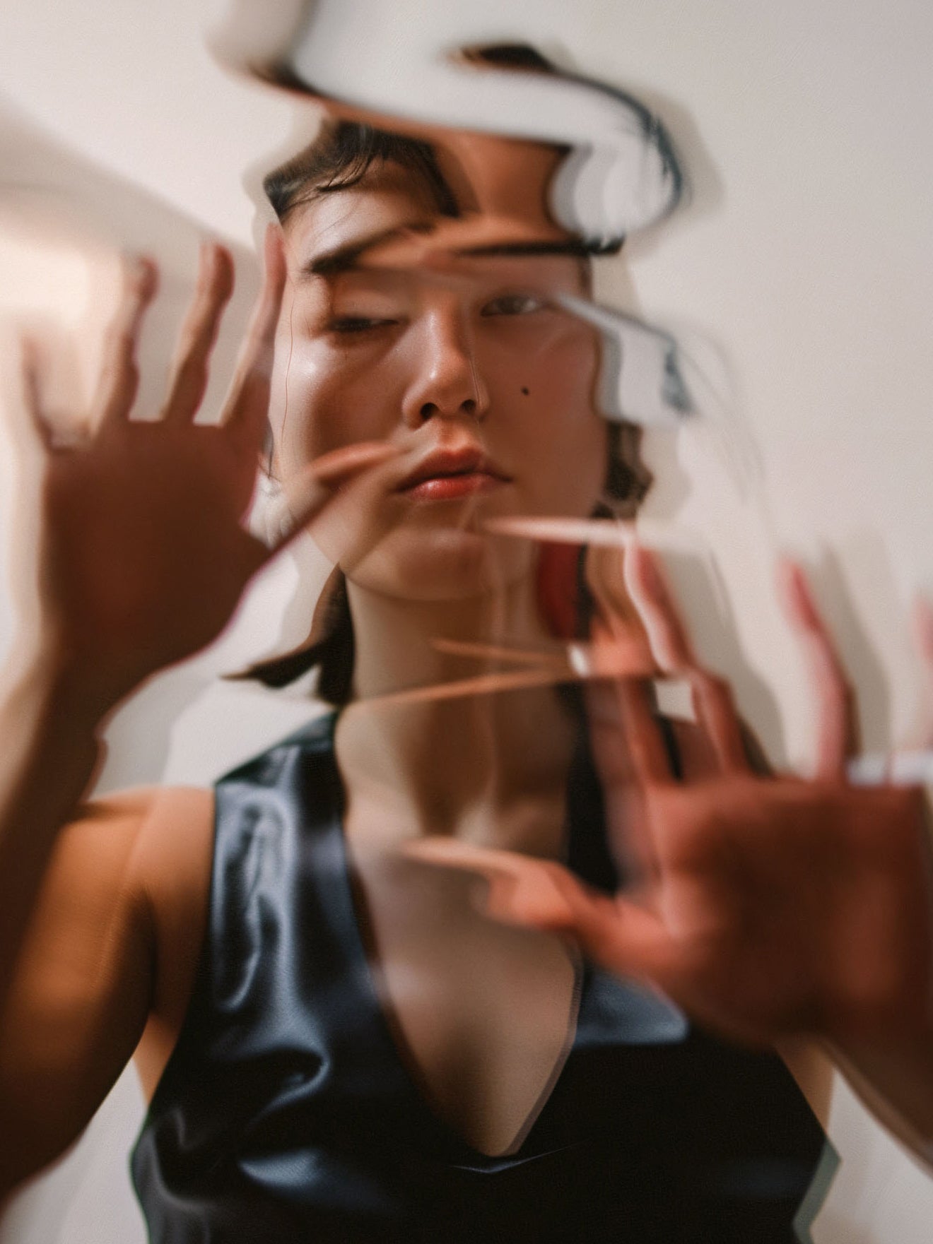 Artistic view of woman behind water ripples